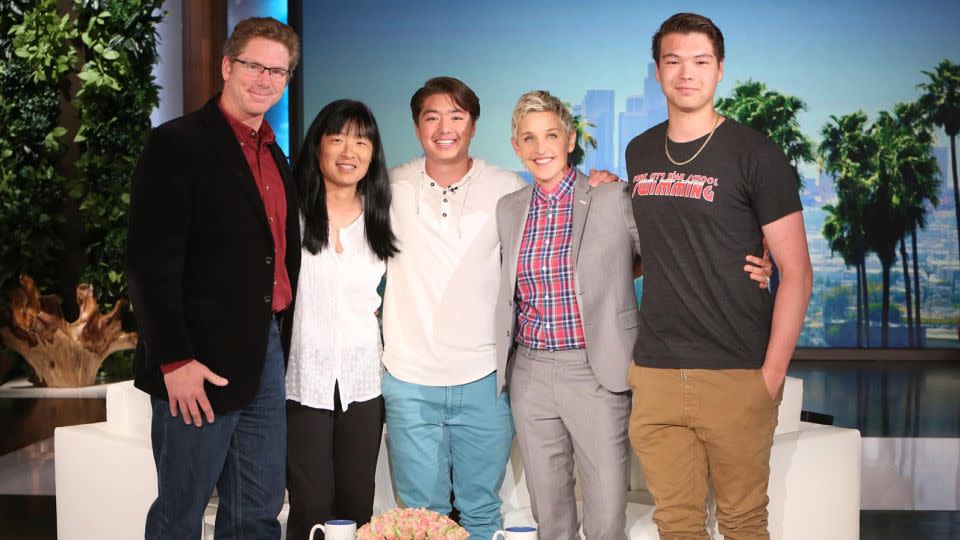 Bailar (center) poses with Ellen DeGeneres, his parents and his brother on the set of "The Ellen DeGeneres Show" in 2016. - Courtesy Schuyler Bailar