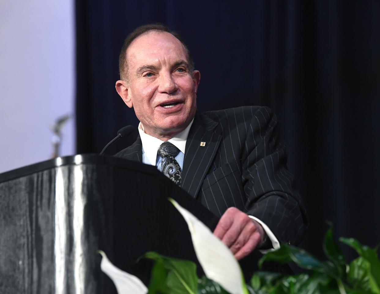 F. Scott Dueser, chairman, president and CEO of First Financial Bankshares, addresses the audience during Tuesday’s annual shareholder luncheon at the Abilene Convention Center.