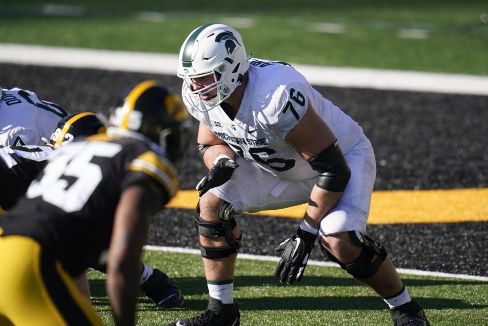 Michigan State offensive tackle AJ Arcuri gets set for a play against Iowa.