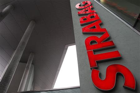 The logo of Austrian builder Strabag is pictured on its headquarters in Vienna in this January 27, 2011 file photo. REUTERS/Lisi Niesner/Files