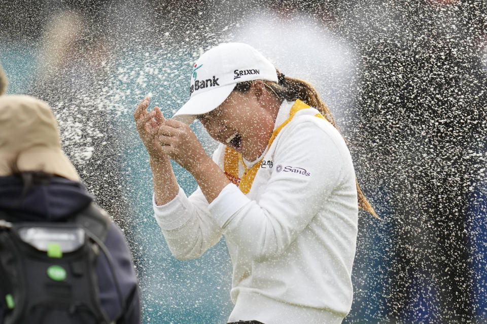 Minjee Lee of Australia is sprayed with champagne after winning the BMW Ladies Championship at the Seowon Hills Country Club in Paju, South Korea, Sunday, Oct. 22, 2023. (AP Photo/Lee Jin-man)