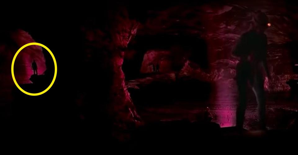 A wide shot of Sarah and her friends exploring a cave in "The Descent"