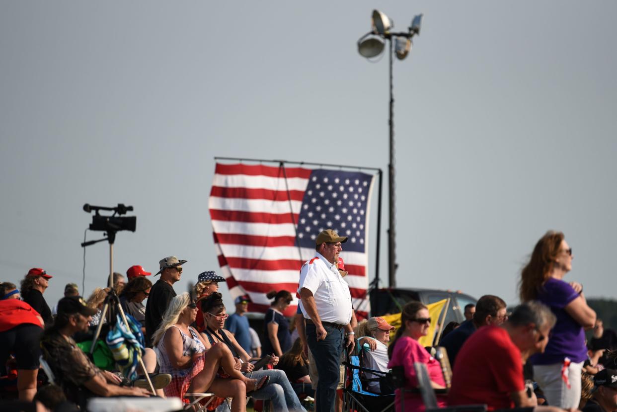 Trump supporters gathered outside of a pavilion for Eric Deters' Freedom Fest last year at his farm in Morning View, Ky.