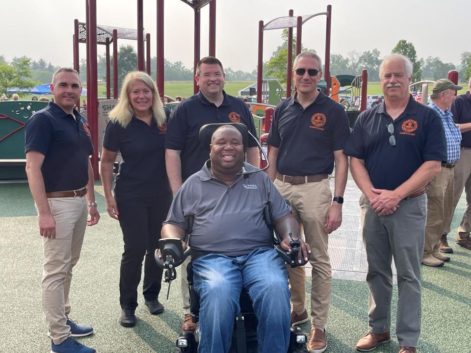 Former Rutgers football player Eric LeGrand and the Hunterdon County commissioners attended the ribbon-cutting of the all-inclusive, ADA-accessible playground at Deer Path Park.