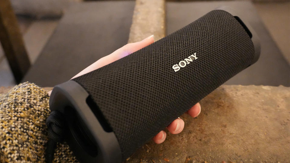 The Sony ULT Field 1 being held in a hand