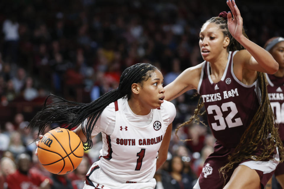 South Carolina guard Zia Cooke (1) drives around Texas A&M forward Aaliyah Patty (32) during the first half of an NCAA college basketball game in Columbia, S.C., Thursday, Dec. 29, 2022. (AP Photo/Nell Redmond)
