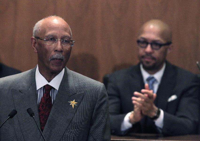 Detroit Mayor Dave Bing lays out his plans and highlights accomplishments in his third State of the City address in Detroit, Wednesday, March 7, 2012. In the background is Detroit City Council President Charles Pugh. (AP Photo/Carlos Osorio)