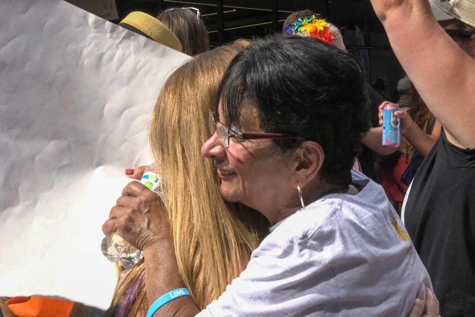 Maryellen Macrina, 73, offered hugs to people who went to the Pride Festival in uptown Charlotte on Saturday, August 17, 2019.