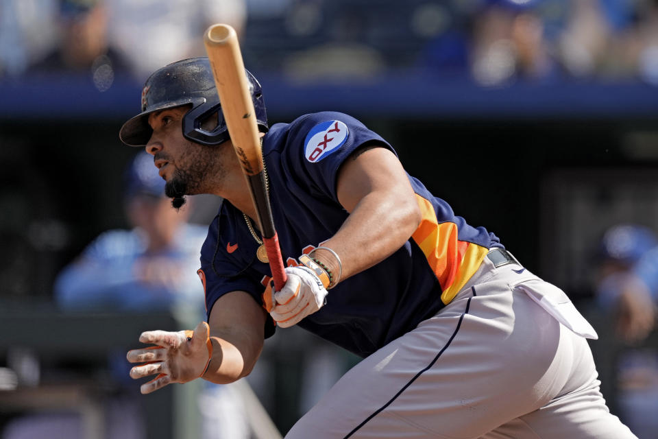 Houston Astros' Jose Altuve watches his RBI single during the ninth inning of a baseball game against the Kansas City Royals Sunday, Sept. 17, 2023, in Kansas City, Mo. The Astros won 7-1. (AP Photo/Charlie Riedel)
