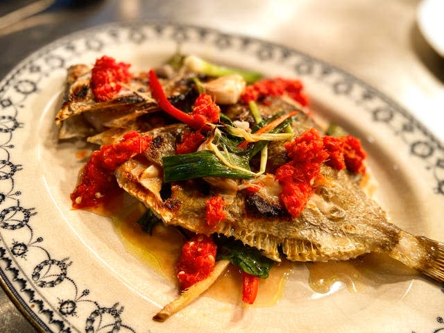 Whole grilled John Dory served Thai-style, in as un-Thai a setting as you can imagine (The Rocket Store)