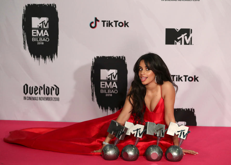 Camila Cabello poses with her awards during the 2018 MTV Europe Music Awards at Bilbao Exhibition Centre in Bilbao, Spain, November 4, 2018. REUTERS/Sergio Perez