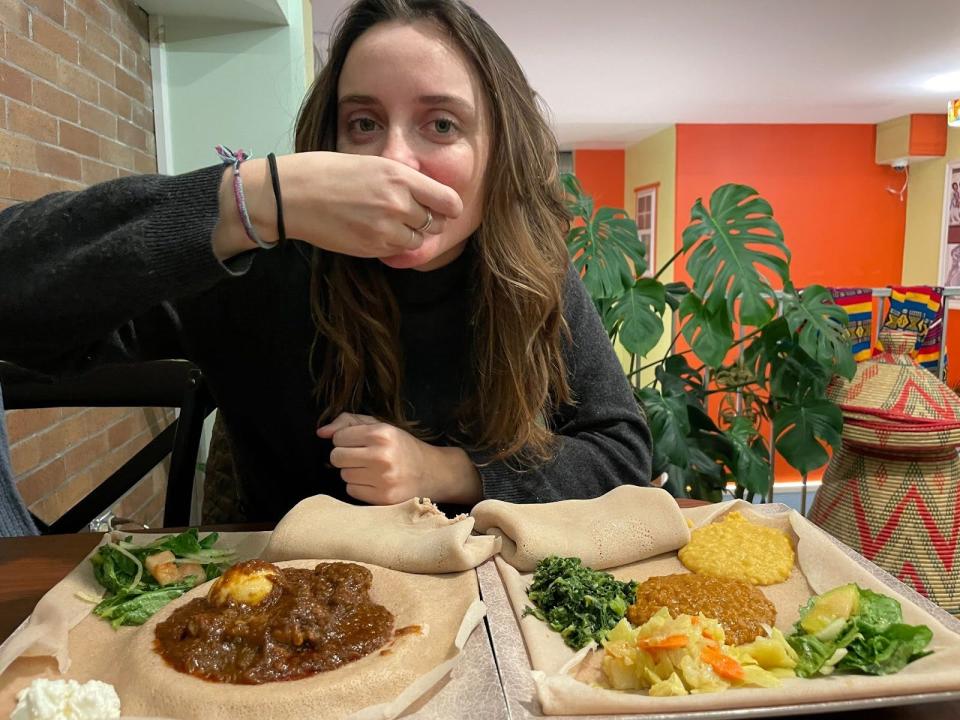 the writer eating at buna cafe in philly