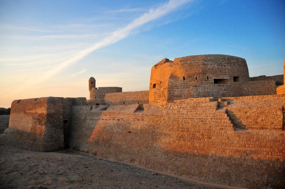 Qal’at al-Bahrain helps tell the story of which civilisations lived in the region (Getty Images)