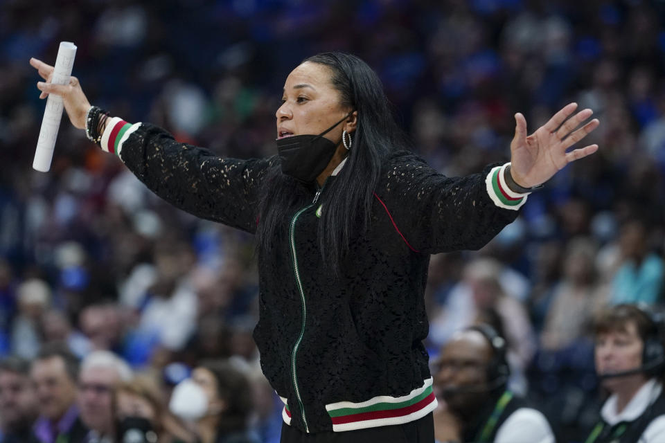 South Carolina head coach Dawn Staley watches the action in the first half of the NCAA women's college basketball Southeastern Conference tournament championship game against Kentucky Sunday, March 6, 2022, in Nashville, Tenn. (AP Photo/Mark Humphrey)