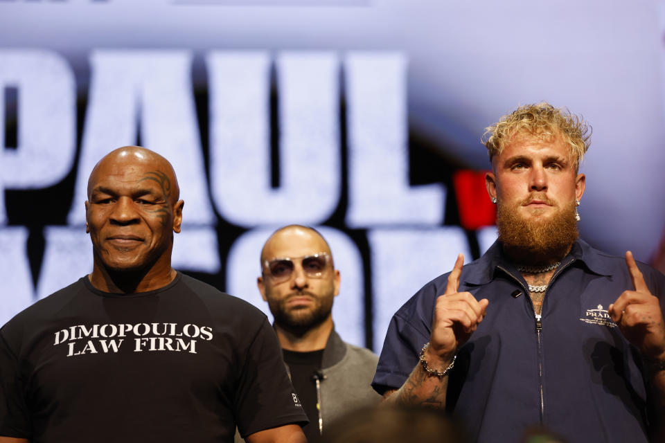 Mike Tyson and Jake Paul speak onstage at the press conference in promotion for the upcoming Jake Paul vs. Mike Tyson boxing match