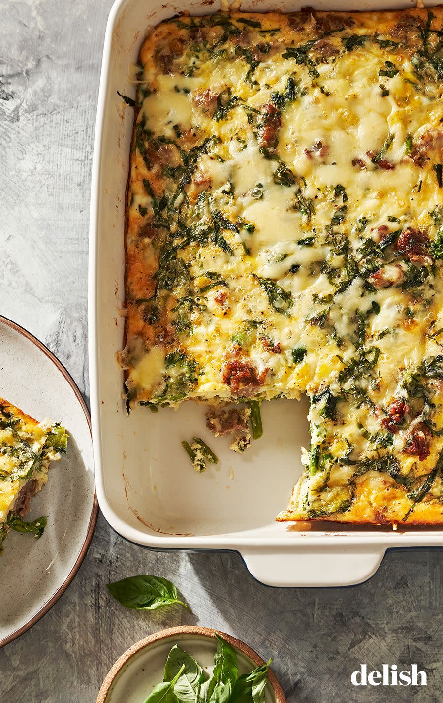 <p>The classic combo of Italian sausage, broccoli rabe, and basil lends itself to a recipe that’s easy to whip up for an impressive <a href="https://www.delish.com/cooking/menus/g2645/brunch-breakfast-recipes/" rel="nofollow noopener" target="_blank" data-ylk="slk:breakfast or brunch;elm:context_link;itc:0;sec:content-canvas" class="link ">breakfast or brunch</a> (and not just if you're eating keto). If you’re new to adding nutmeg to savory recipes, trust us: it adds a subtle, mysterious note that will have your guests wondering why this recipe is so delicious.</p><p>Get the <strong><a href="https://www.delish.com/cooking/recipe-ideas/a38176118/keto-breakfast-casserole-recipe/" rel="nofollow noopener" target="_blank" data-ylk="slk:Keto Breakfast Casserole recipe;elm:context_link;itc:0;sec:content-canvas" class="link ">Keto Breakfast Casserole recipe</a></strong>.</p>