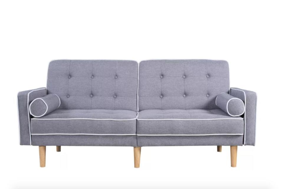 This <a href="https://www.allmodern.com/furniture/pdp/mid-century-modern-convertible-sofa-mhus1192.html?piid[0]=18802934&amp;piid=18802935#readmoremodal1" target="_blank">couch is currently 45% off</a>, and with its simple and sleek design, it's the perfect addition to your small space.