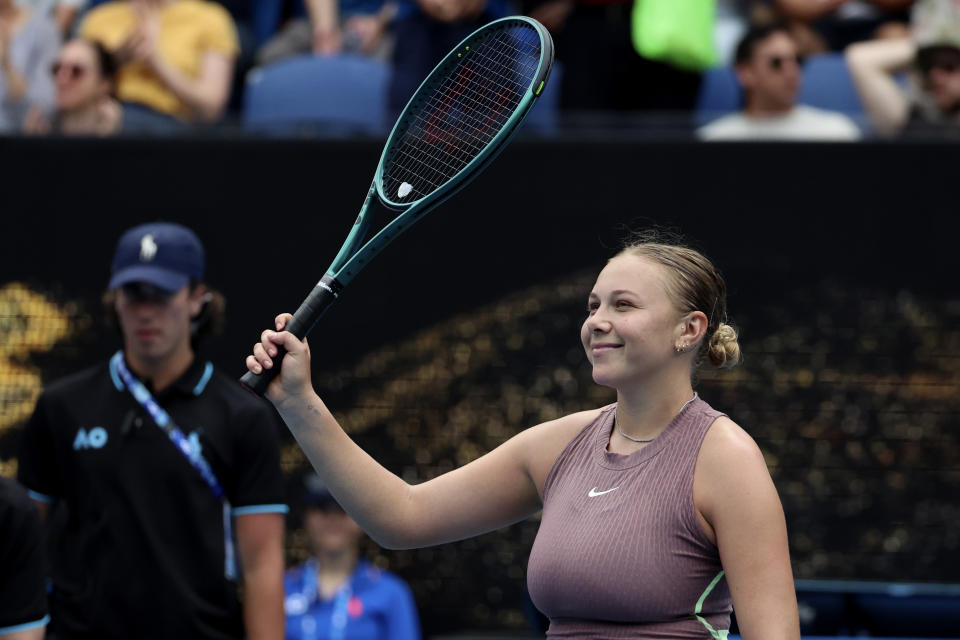 Amanda Anisimova of the U.S. reacts after defeating Liudmila Samsonova of Russia in their first round match at the Australian Open tennis championships at Melbourne Park, Melbourne, Australia, Sunday, Jan. 14, 2024. (AP Photo/Asanka Brendon Ratnayake)