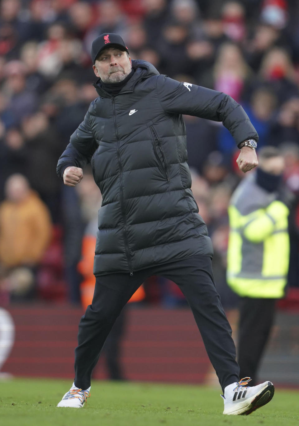 Liverpool's manager Jurgen Klopp celebrates at the end of an English Premier League soccer match between Liverpool and Brentford at Anfield in Liverpool, England, Sunday, Jan. 16, 2022. (AP Photo/Jon Super)