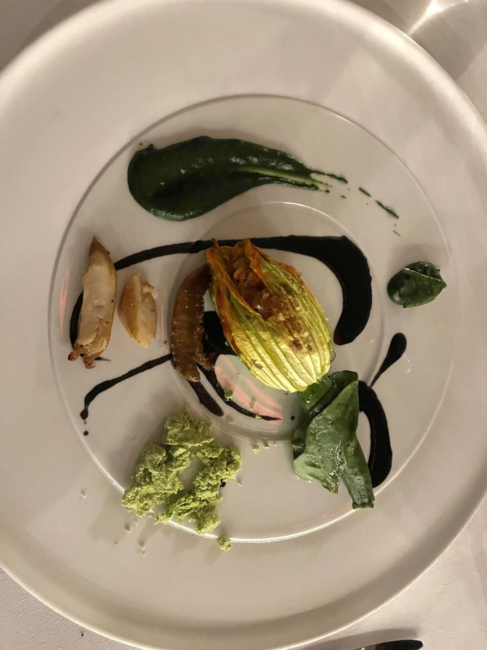 A course of abalone, with ratatouille-stuffed squash.