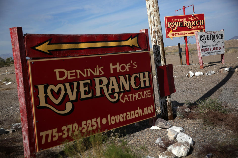 CRYSTAL, NV - OCTOBER 14:  Signs for Dennis Hof's Love Ranch Las Vegas brothel are shown on October 14, 2015 in Crystal, Nevada. Former NBA player Lamar Odom was found unconscious during a visit at the brothel and has been hospitalized at Sunrise Hospital & Medical Center in Las Vegas.  (Photo by Alex Wong/Getty Images)