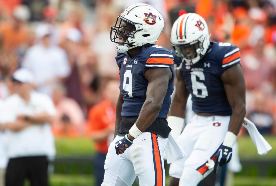 Auburn Tigers linebacker Eugene Asante (9) celebrates a defensive stop as Auburn Tigers take on Mississippi State Bulldogs at Jordan-Hare Stadium in Auburn, Ala., on Saturday, Oct. 28, 2023. Auburn Tigers lead Mississippi State Bulldogs 24-3 at halftime.