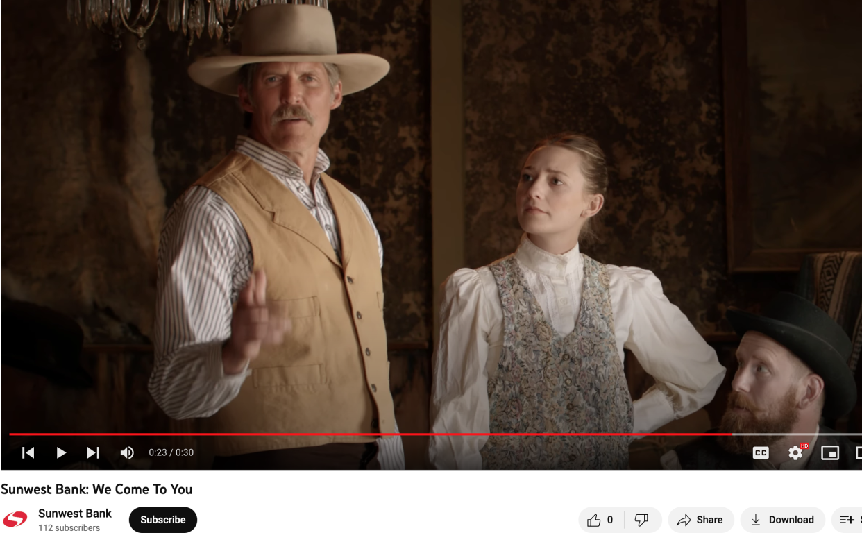 Eric Hovde, left, the chairman and CEO of California-based Sunwest Bank, appears in an Old West-themed ad for the company.