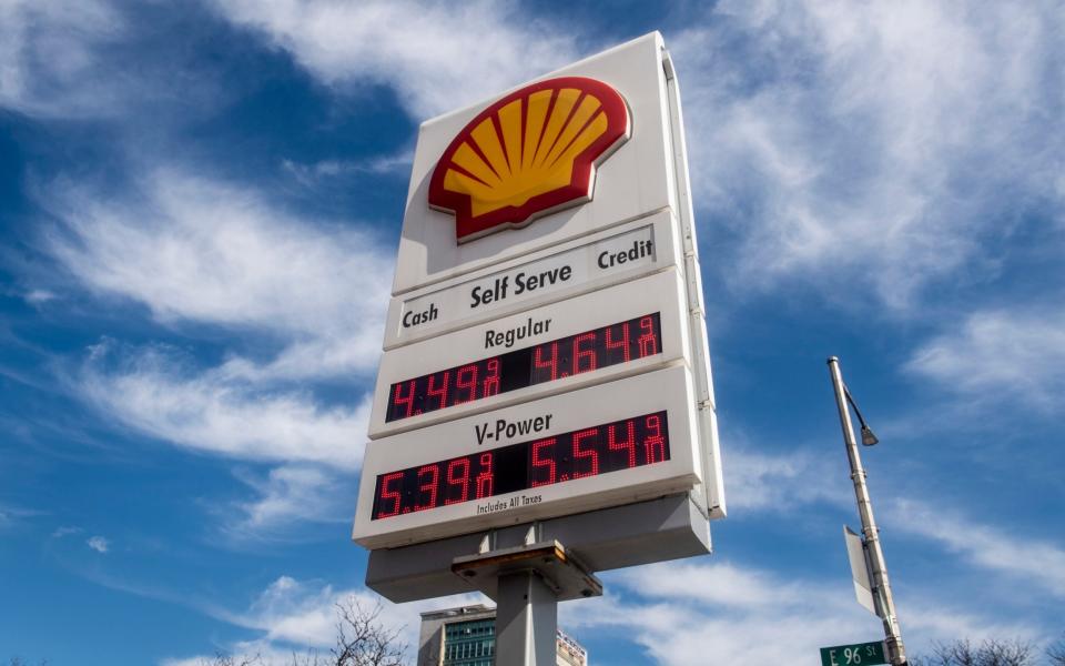 View of the prices of gas at the Shell gas station on Friday, March 25, 2022, in New York. The spike in gasoline prices recently prompted ride-hailing app companies Uber and Lyft to temporarily hit passengers in many cities with a small surcharge to help drivers â€” who pay for their own fuel. But they declined to apply the surcharge in New York City.   - Brittainy Newman /AP