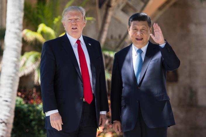 Chinese President Xi Jinping and US President Donald Trump agreed on the bilateral security dialogue at their April meeting in Florida (AFP Photo/JIM WATSON)