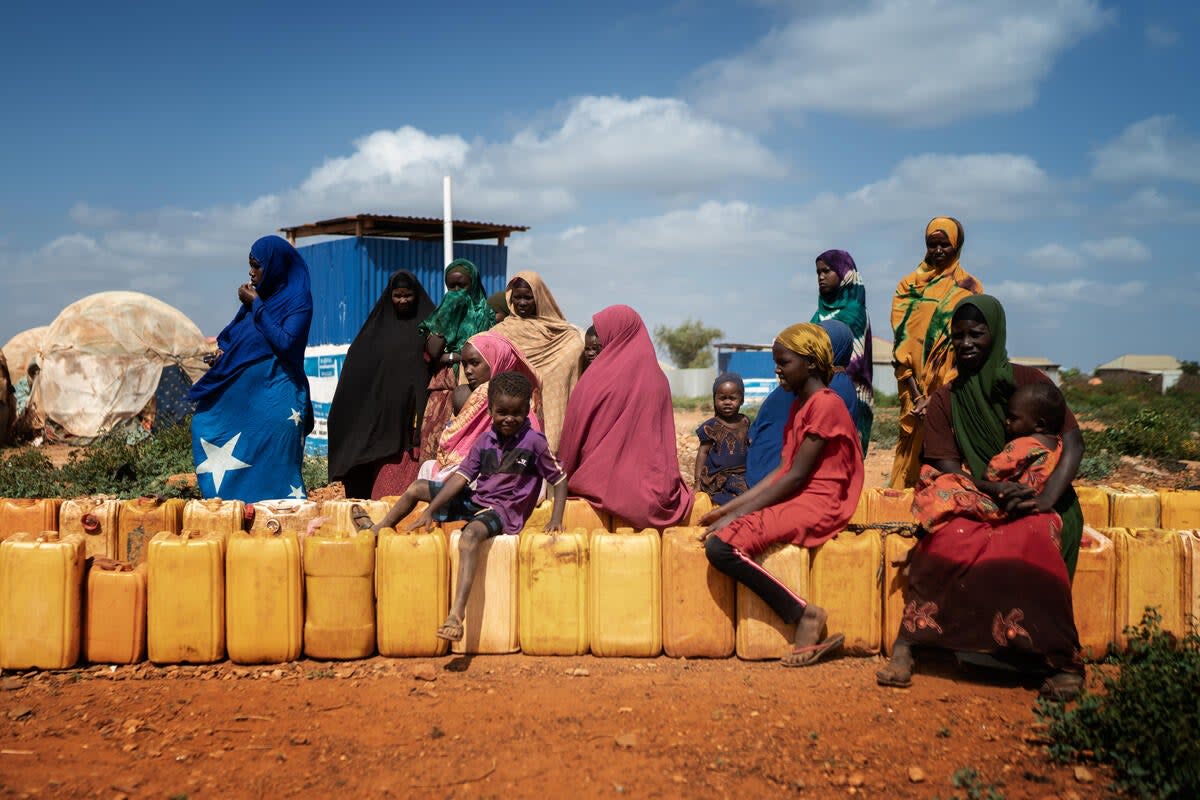 A group of women and children wait in line to buy water in Baidoa (Fredrik Lerneryd/Save the Children)