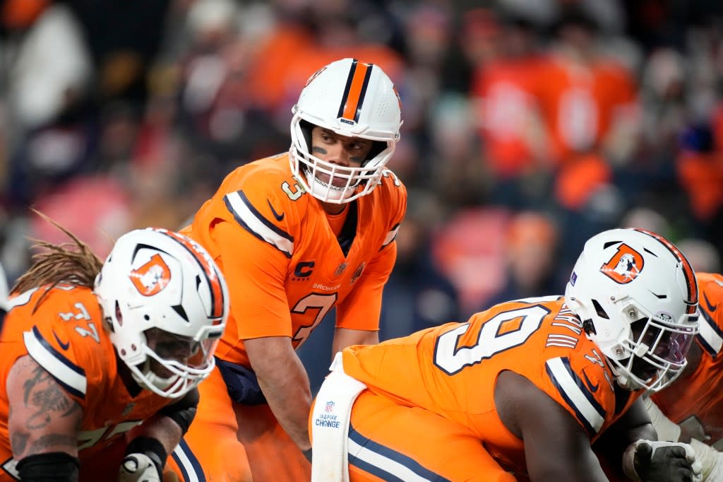 Denver Broncos quarterback Russell Wilson (3) waits on the snap during the second half of an NFL football game against the New England Patriots, Sunday, Dec. 24, 2023, in Denver. (AP Photo/David Zalubowski)