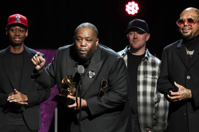 <p>Leon Bennett/Getty</p> Killer Mike accepts the best rap song award for "Scientists & Engineers" onstage during the Grammys on Feb. 4, 2024 in Los Angeles