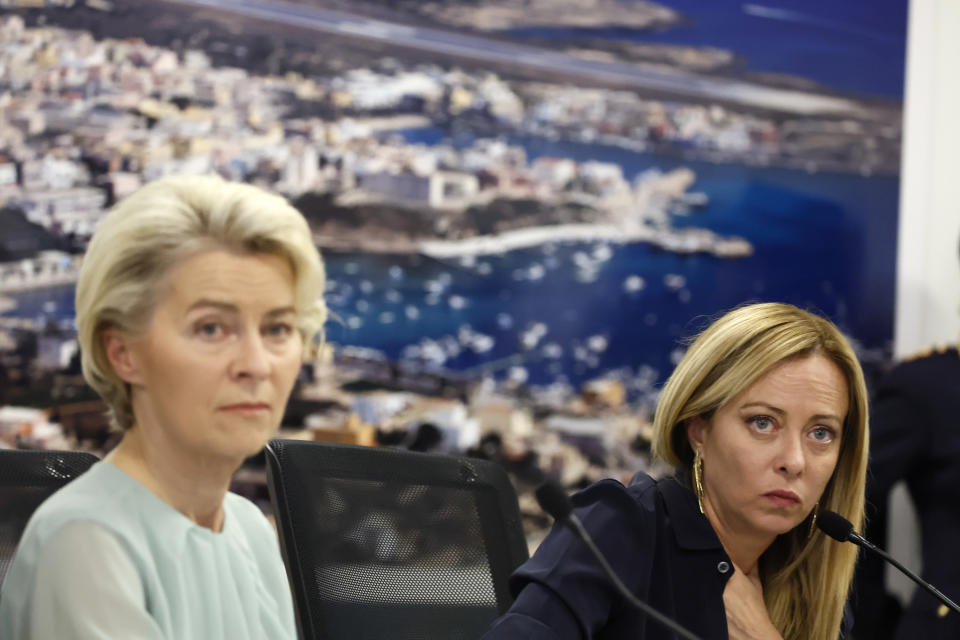 The President of the European Commission, Ursula von der Leyen, left, and Italy's Premier Giorgia Meloni, right, address the media during a joint press conference following a visit of the island of Lampedusa in Italy, Sunday, Sept. 17, 2023. EU Commission President Ursula von der Leyen and Italian Premier Giorgia Meloni on Sunday toured a migrant center on Italy’s southernmost island of Lampedusa that was overwhelmed with nearly 7,000 arrivals in a 24-hour period this week. (Cecilia Fabiano/LaPresse via AP)