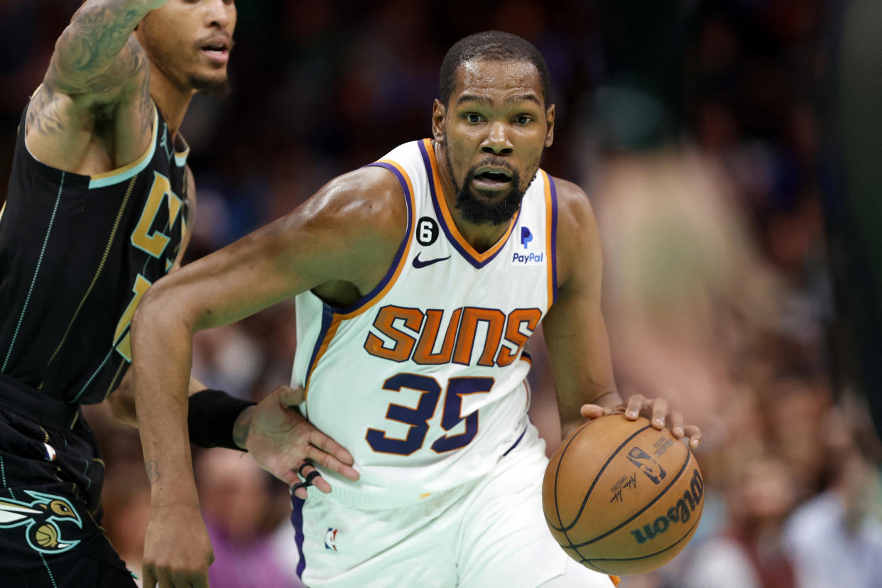 Phoenix Suns forward Kevin Durant drives to the basket past Charlotte Hornets guard Kelly Oubre Jr. at Spectrum Center in Charlotte, North Carolina, on March 1, 2023. (Brian Westerholt/USA TODAY Sports)