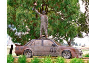 <p>GM’s Australian division <strong>Holden</strong> had a performance arm called the Holden Dealer Team (HDT) run by enigmatic race car driver <strong>Peter Brock </strong>(1945-2006). In 1986 Brock began to install a gadget dubbed the "Energy Polariser" into HDT vehicles. The machine contained crystals and magnets in an epoxy resin that, he claimed, improved the performance and handling of vehicles through "aligning the molecules". </p><p>GM was not impressed by this theory and total lack of any evidence-based benefits, and dropped its association with Brock. It set up Holden Special Vehicles instead, in conjunction with Scottish businessman <strong>Tom Walkinshaw</strong>, of TWR fame. Brock died in an accident in 2006 during a rally, aged 61, and this is his memorial.</p>