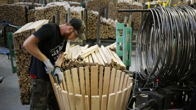 A man building a new oak barrel