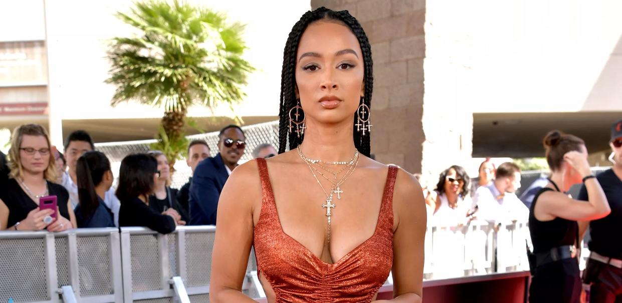 Draya Michele poses at an event