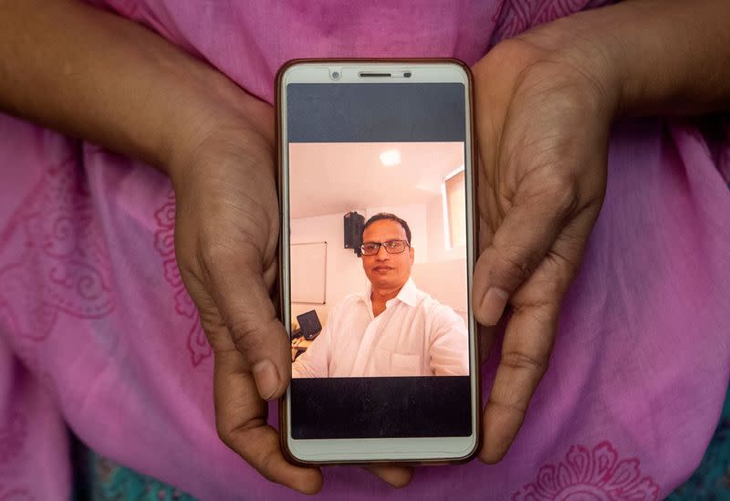 The Wider Image: Indians share the stories of loved ones they lost to the pandemic