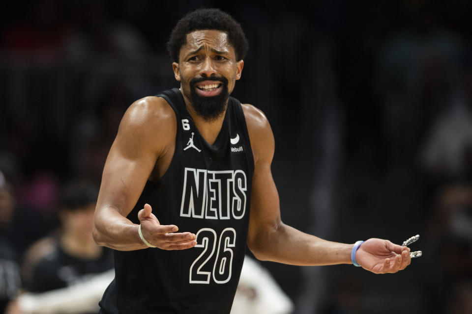 Brooklyn Nets guard Spencer Dinwiddie reacts after foul call during the second half of an NBA basketball game against the Atlanta Hawks, Sunday, Feb. 26, 2023, in Atlanta. (AP Photo/Hakim Wright Sr.)