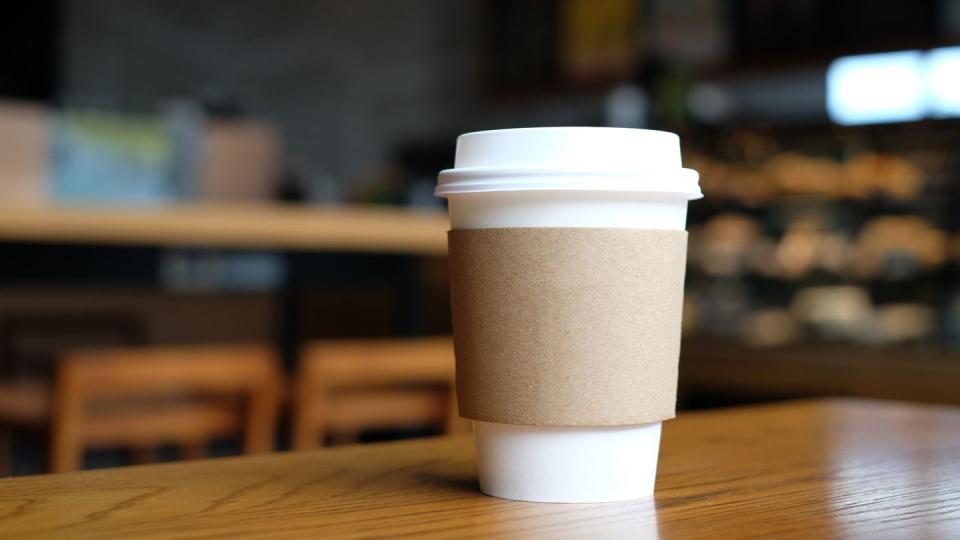 brown paper coffee cup