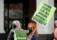 Amazon workers arrive with paperwork to unionize at the NLRB office in Brooklyn