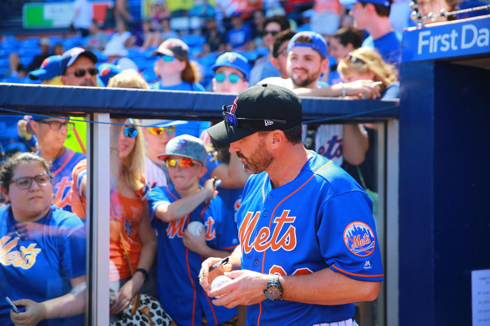 <p>New York Mets manager Mickey Callaway signs for fans before a game against the Atlanta Braves at First Data Field in Port St. Lucie, Fla., Feb. 23, 2018. (Photo: Gordon Donovan/Yahoo News) </p>