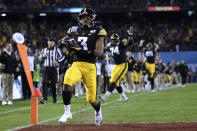 Iowa wide receiver Tyrone Tracy Jr. (3) scores a touchdown during the first half of the Holiday Bowl NCAA college football game against Southern California, Friday, Dec. 27, 2019, in San Diego. (AP Photo/Orlando Ramirez)