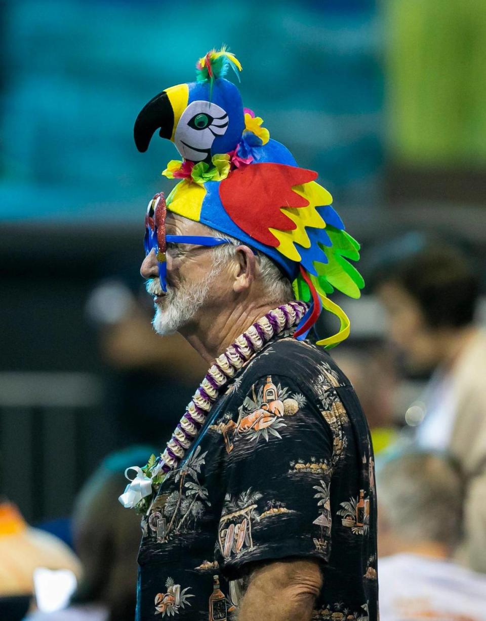 A Jimmy Buffett “Parrot Head” fan is seen before the start of a Jimmy Buffett and the Coral Reefer Band concert at the iTHINK Financial Amphitheatre in West Palm Beach, Florida on Thursday, Dec. 9, 2021.