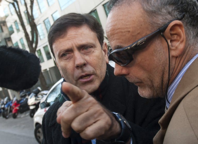 Dr Eufemiano Fuentes (L) arrives at the court house in Madrid on Monday. Among the five defendants facing charges of an "offence against public health", the most prominent is the suspected mastermind of the network, 57-year-old doctor Eufemiano Fuentes