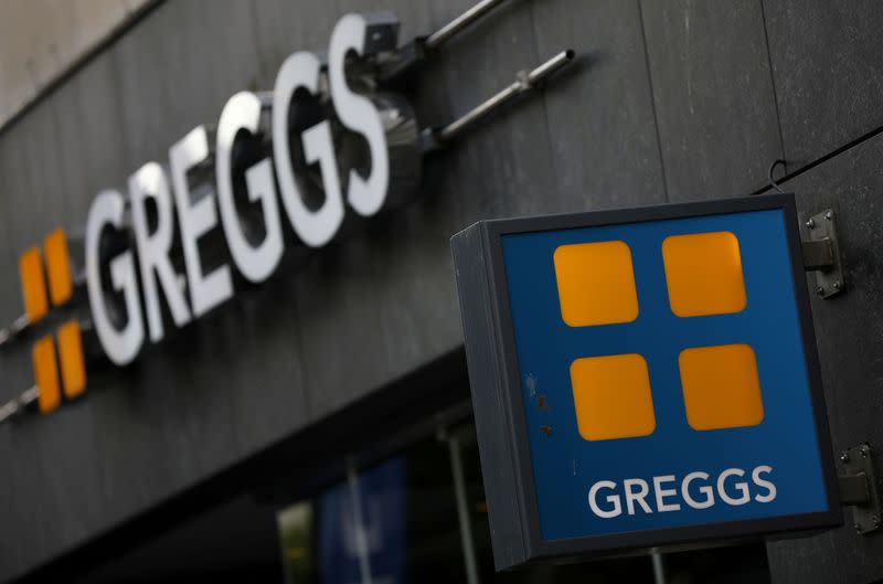 FILE PHOTO: Signage and logo are pictured outside a branch of Greggs in Liverpool