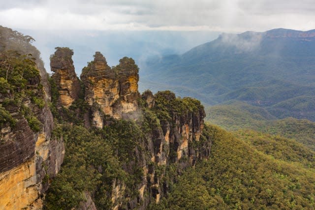 The Three Sisters rock formation at Echo Point in the Blue Mountains west of Sydney, NSW, Australia.