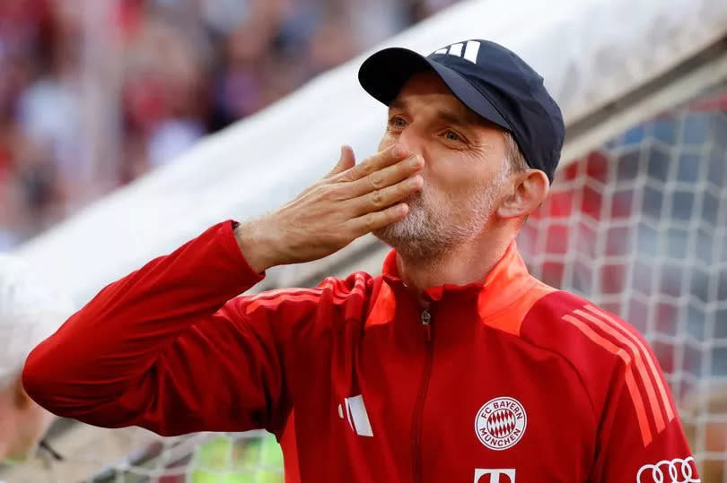 Bayern Munich's German head coach Thomas Tuchel blows kisses to fans as he arrives for the German first division Bundesliga football match between FC Bayern Munich and VfL Wolfsburg in Munich, southern Germany on May 12, 2024. (Photo by Michaela STACHE / AFP) / DFL REGULATIONS PROHIBIT ANY USE OF PHOTOGRAPHS AS IMAGE SEQUENCES AND/OR QUASI-VIDEO (Photo by MICHAELA STACHE/AFP via Getty Images)