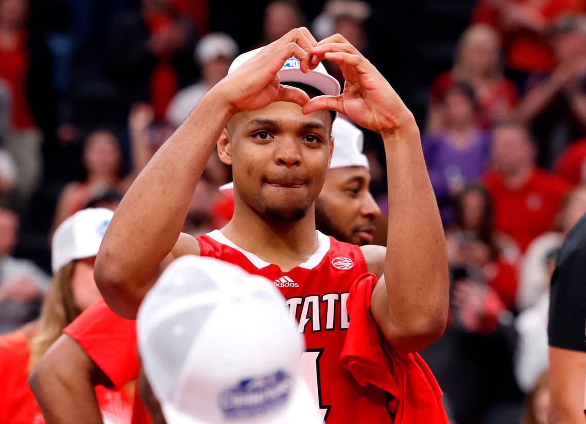N.C. State’s Casey Morsell (14) responds to the crowd after N.C. State’s 84-76 victory over UNC in the championship game of the 2024 ACC Men’s Basketball Tournament at Capital One Arena in Washington, D.C., Saturday, March 16, 2024. Ethan Hyman/ehyman@newsobserver.com