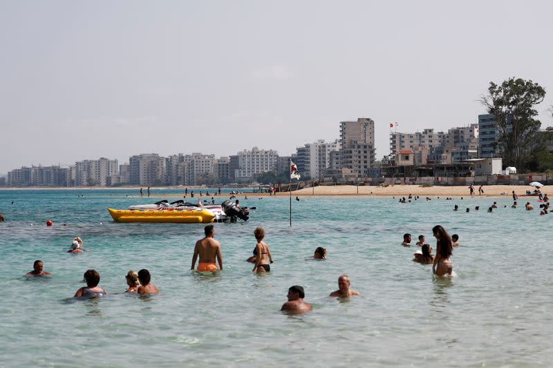 FILE PHOTO: Varosha, an area fenced off by the Turkish military since the 1974 division of Cyprus, is seen from a beach in Famagusta